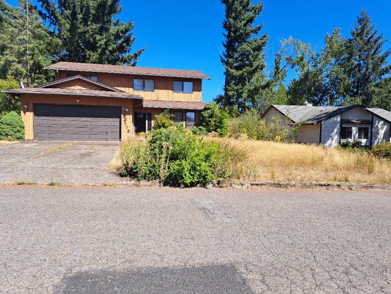 Full view (from the street) of front and side yard.